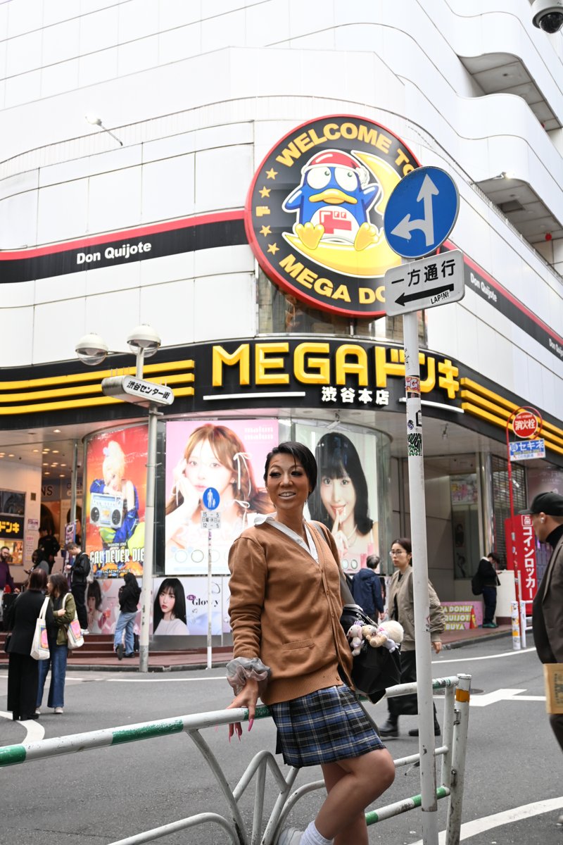 Guest in full gyaru look posing on a Shibuya street